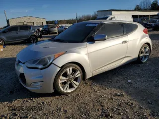 2012 Hyundai Veloster w/Gray Int с VIN KMHTC6AD2CU050738, выставлен на аукционе Copart как лот 42136435 с пробегом 151 482 миль миль и Списание • Salvage title. История ставок и продаж доступна на DreamBid. Изображение 1.