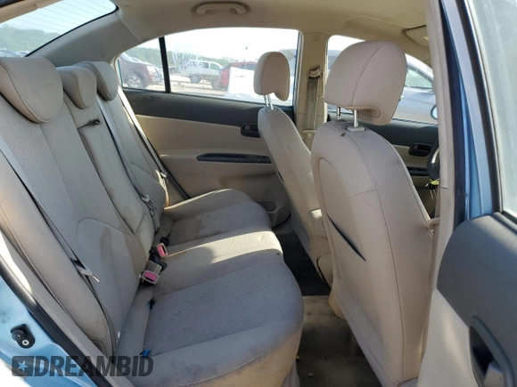 2006 Hyundai Accent GLS z VIN KMHCN46C56U050963, wystawiony jako Copart lot #60979955 z przebiegiem Nie podano mil oraz Czysty tytuł • Clean title. Historia ofert i sprzedaży dostępna na DreamBid. Obrazek 10.