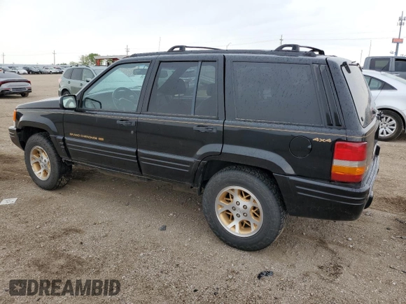 1997 Jeep Grand Cherokee Limited z VIN 1J4GZ78Y8VC586034, wystawiony jako Copart lot #58061705 z przebiegiem 244 355 mil mil oraz Czysty tytuł • Clean title. Historia ofert i sprzedaży dostępna na DreamBid. Obrazek 2.