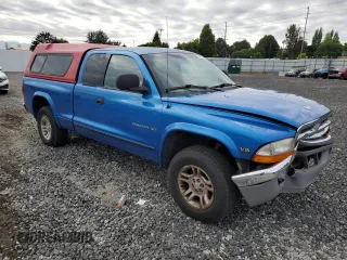 1998 Dodge Dakota SLT with VIN 1B7GG22Y2WS597545, listed as a Copart auction lot 70877014 with 261,522 mi miles and Salvage Title. Bid and sale history available at carsss.com. Image 4.