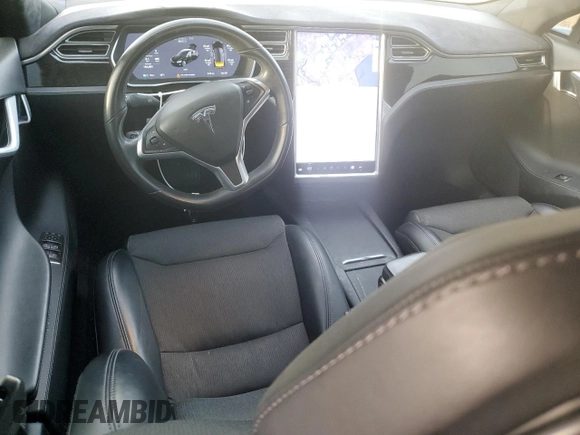 2017 Tesla Model S 100D with VIN 5YJSA1E27HF185487, listed as a Copart auction lot 47979455 with 184,987 mi miles and Salvage Title. Bid and sale history available at DreamBid. Image 8.