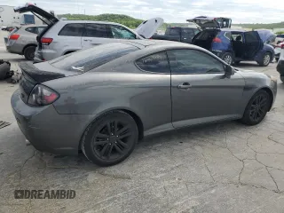 2007 Hyundai Tiburon GS z VIN KMHHM66D47U243846, wystawiony jako Copart lot #57509725 z przebiegiem 181 941 mil mil oraz Szkoda całkowita • Salvage title. Historia ofert i sprzedaży dostępna na DreamBid. Obrazek 3.