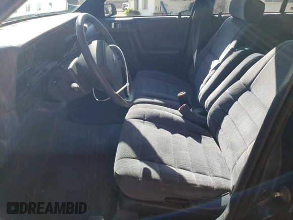 1994 Plymouth Acclaim z VIN 3P3AA46K8RT200674, wystawiony jako Copart lot #76425504 z przebiegiem 105 874 mil mil oraz Szkody całkowita. Historia ofert i sprzedaży dostępna na DreamBid. Obrazek 7.