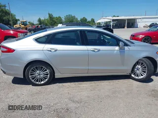 2016 Ford Fusion SE with VIN 3FA6P0T90GR374060, listed as a IAAI auction lot 42037332 with 145,676 mi miles. Bid and sale history available at carsss.com. Image 12.
