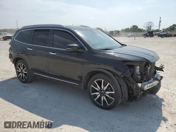2020 Honda Pilot Touring 8-Passenger with VIN 5FNYF5H98LB013778, listed as a Copart auction lot 53112115 with 86,276 mi miles and Salvage Title. Bid and sale history available at DreamBid. Image 4.