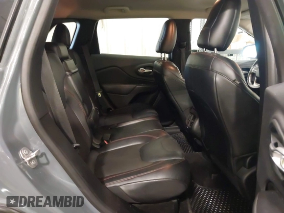 2015 Jeep Cherokee Trailhawk with VIN 1C4PJMBB4FW528633, listed as a IAAI auction lot 42147632 with 166,669 mi miles and . Bid and sale history available at DreamBid. Image 8.