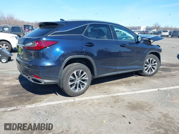 2022 Lexus RX with VIN 2T2HZMDA4NC358746, listed as a IAAI auction lot 41772090 with 26,370 mi miles. Bid and sale history available at carsss.com. Image 4.