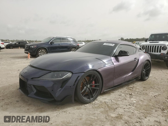 2022 Toyota Supra 3.0 z VIN WZ1DB0C03NW050968, wystawiony jako Copart lot #44450175 z przebiegiem 22 420 mil mil oraz Szkoda całkowita • Salvage title. Historia ofert i sprzedaży dostępna na DreamBid. Obrazek 1.