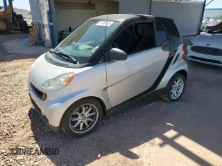 2009 Smart fortwo Pure z VIN WMEEJ31X99K223298, wystawiony jako Copart lot #57250545 z przebiegiem 178 105 mil mil oraz Czysty tytuł • Clean title. Historia ofert i sprzedaży dostępna na DreamBid. Obrazek 1.