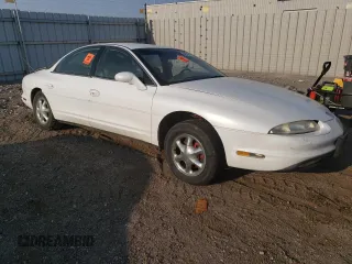 1997 Oldsmobile Aurora z VIN 1G3GR62CXV4124968, wystawiony jako Copart lot #69615474 z przebiegiem 249 895 mil mil oraz Nie do naprawy. Historia ofert i sprzedaży dostępna na DreamBid. Obrazek 4.