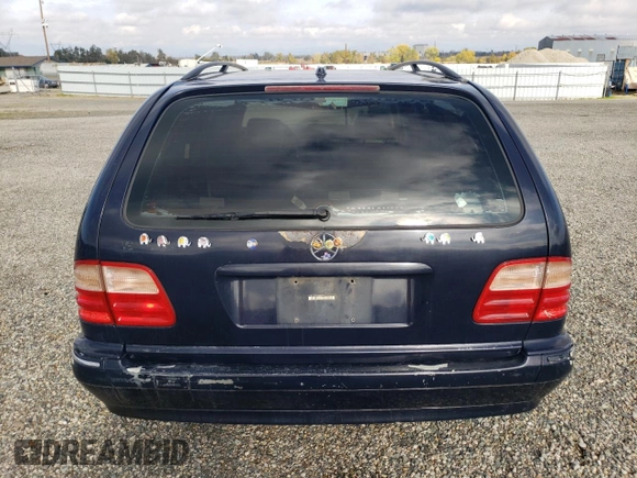 2001 Mercedes-Benz E-Class with VIN WDBJH65JX1B387291, listed as a Copart auction lot 79756824 with 261,205 mi miles and Salvage Title. Bid and sale history available at carsss.com. Image 6.