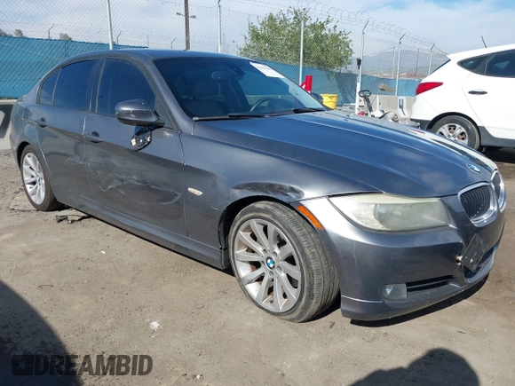 2011 BMW 3 Series 328i with VIN WBAPH5G55BNM71702, listed as a IAAI auction lot 42013598 with 192,744 mi miles. Bid and sale history available at carsss.com. Image 1.