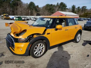 2016 MINI Hardtop 4 Door with VIN WMWXU1C51G2D08650, listed as a Copart auction lot 48389795 with 51,106 mi miles and Salvage Title. Bid and sale history available at DreamBid. Image 1.
