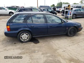 1997 Saturn SW z VIN 1G8ZK8279VZ361444, wystawiony jako Copart lot #58929684 z przebiegiem 128 554 mil mil oraz Tytuł czysty. Historia ofert i sprzedaży dostępna na DreamBid. Obrazek 3.