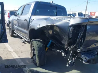 2020 Toyota Tacoma SR5 with VIN 3TMCZ5AN2LM351472, listed as a IAAI auction lot 41621286 with 48,402 mi miles and . Bid and sale history available at DreamBid. Image 6.