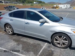 2013 Nissan Altima SV z VIN 1N4BL3AP3DN425384, wystawiony jako IAAI lot #42471028 z przebiegiem 154 095 mil mil oraz . Historia ofert i sprzedaży dostępna na DreamBid. Obrazek 12.