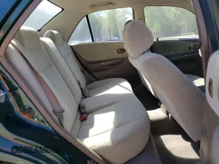 1999 Mazda Protege DX with VIN JM1BJ2223X0139775, listed as a Copart auction lot 54338455 with 63,198 mi miles and Salvage Title. Bid and sale history available at DreamBid. Image 10.