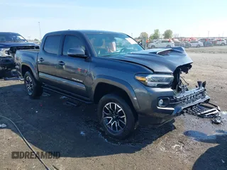 2022 Toyota Tacoma SR5 with VIN 3TMAZ5CN6NM186713, listed as a IAAI auction lot 41873036 with 60,704 mi miles and . Bid and sale history available at DreamBid. Image 1.