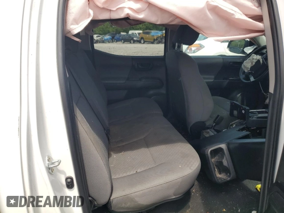 2023 Toyota Tacoma SR z VIN 3TMCZ5AN7PM594216, wystawiony jako Copart lot #55870755 z przebiegiem 60 548 mil mil oraz Szkoda całkowita • Salvage title. Historia ofert i sprzedaży dostępna na DreamBid. Obrazek 10.