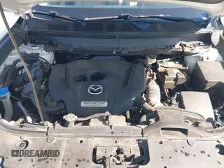 2019 Mazda CX-9 Touring z VIN JM3TCACY3K0333931, wystawiony jako IAAI lot #41968519 z przebiegiem 102 992 mil mil oraz . Historia ofert i sprzedaży dostępna na DreamBid. Obrazek 10.