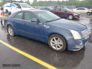 2009 Cadillac CTS AWD w/1SB with VIN 1G6DT57V190120218, listed as a IAAI auction lot 42105030 with 214,031 mi miles. Bid and sale history available at carsss.com. Image 1.