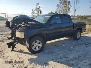 2008 Dodge Dakota Bighorn/Lonestar z VIN 1D7HE38KX8S570119, wystawiony jako Copart lot #74081024 z przebiegiem 129 665 mil mil oraz Szkoda całkowita • Salvage title. Historia ofert i sprzedaży dostępna na DreamBid. Obrazek 1.