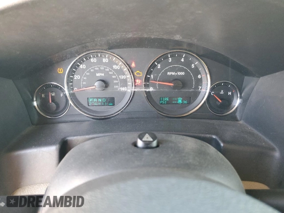 2006 Jeep Commander Limited z VIN 1J8HH58N46C125639, wystawiony jako Copart lot #74521154 z przebiegiem 276 411 mil mil oraz Szkoda całkowita • Salvage title. Historia ofert i sprzedaży dostępna na DreamBid. Obrazek 9.