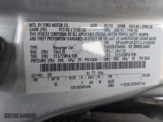 2012 Ford Focus SE with VIN 1FAHP3K27CL416859, listed as a IAAI auction lot 41418565 with 114,525 mi miles. Bid and sale history available at carsss.com. Image 9.