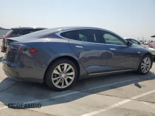 2014 Tesla Model S 60 z VIN 5YJSA1H11EFP64764, wystawiony jako Copart lot #64265815 z przebiegiem 126 191 mil mil oraz Szkoda całkowita • Salvage title. Historia ofert i sprzedaży dostępna na DreamBid. Obrazek 3.