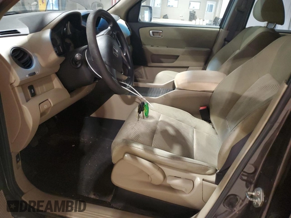 2012 Honda Pilot LX with VIN 5FNYF4H25CB010625, listed as a Copart auction lot 57208515 with 81,617 mi miles and Salvage title. Bid and sale history available at DreamBid. Image 7.