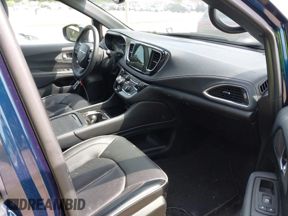 2023 Chrysler Pacifica Limited with VIN 2C4RC3GGXPR555282, listed as a IAAI auction lot 42452848 with 18,373 mi miles and . Bid and sale history available at DreamBid. Image 5.