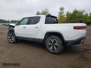 2022 Rivian R1T Adventure Package with VIN 7FCTGAAA8NN012505, listed as a Copart auction lot 72496734 with 5,916 mi miles and Salvage Title. Bid and sale history available at carsss.com. Image 2.