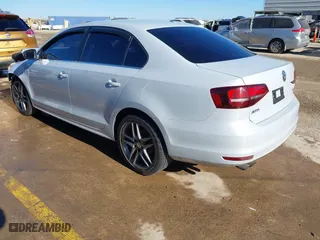 2017 Volkswagen Jetta 1.4T S with VIN 3VW167AJ0HM405252, listed as a IAAI auction lot 41200004 with 82,015 mi miles. Bid and sale history available at carsss.com. Image 3.