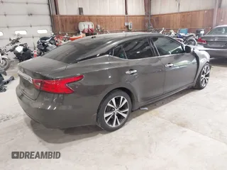 2016 Nissan Maxima Platinum with VIN 1N4AA6AP3GC404618, listed as a IAAI auction lot 42372458 with 133,968 mi miles and . Bid and sale history available at DreamBid. Image 4.