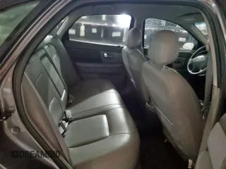 2002 Ford Taurus SES Standard z VIN 1FAFP55U72A161401, wystawiony jako Copart lot #55893125 z przebiegiem 128 258 mil mil oraz Czysty tytuł • Clean title. Historia ofert i sprzedaży dostępna na DreamBid. Obrazek 10.