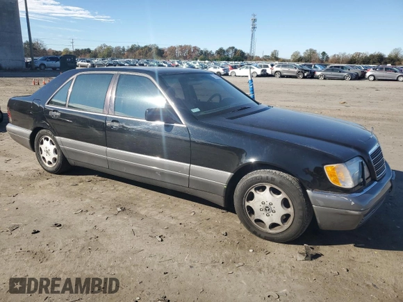 1995 Mercedes-Benz S with VIN WDBGA51E7SA246509, listed as a Copart auction lot 79333654 with 143,257 mi miles and Clean Title. Bid and sale history available at DreamBid. Image 4.