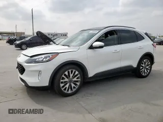 2020 Ford Escape Titanium Hybrid с VIN 1FMCU0DZ7LUC34753, выставлен на аукционе Copart как лот 51308385 с пробегом 70 323 миль миль и Списание • Salvage title. История ставок и продаж доступна на DreamBid. Изображение 1.