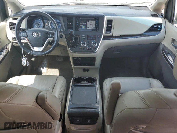 2015 Toyota Sienna XLE with VIN 5TDYK3DC4FS643797, listed as a Copart auction lot 55975385 with 61,882 mi miles and Salvage Title. Bid and sale history available at DreamBid. Image 8.