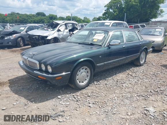 1999 Jaguar XJ with VIN SAJKD6048XC869099, listed as a IAAI auction lot 42761055 with 124,326 mi miles and . Bid and sale history available at DreamBid. Image 2.