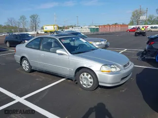 1996 Honda Civic EX with VIN 1HGEJ8249TL090500, listed as a IAAI auction lot 41927643 with 164,067 mi miles. Bid and sale history available at carsss.com. Image 1.