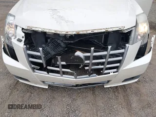 2012 Cadillac CTS Luxury с VIN 1G6DG5E57C0107018, выставлен на аукционе IAAI как лот 41554564 с пробегом 101 256 миль миль и . История ставок и продаж доступна на DreamBid. Изображение 6.