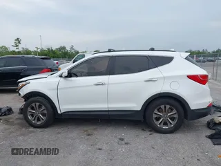 2014 Hyundai Santa Fe with VIN 5XYZU3LB9EG229255, listed as a IAAI auction lot 42407410 with 201,523 mi miles and . Bid and sale history available at DreamBid. Image 15.