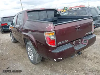 2008 Honda Ridgeline RTL with VIN 2HJYK16588H519600, listed as a IAAI auction lot 41941260 with 161,267 mi miles. Bid and sale history available at carsss.com. Image 3.