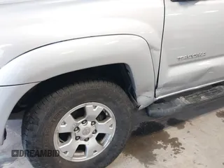 2011 Toyota Tacoma with VIN 3TMMU4FN1BM031502, listed as a IAAI auction lot 41333647 with 151,373 mi miles and . Bid and sale history available at DreamBid. Image 6.