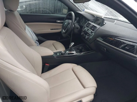 2017 BMW 2 Series 230i with VIN WBA2K9C51HV646724, listed as a IAAI auction lot 41561027 with 57,660 mi miles. Bid and sale history available at carsss.com. Image 5.