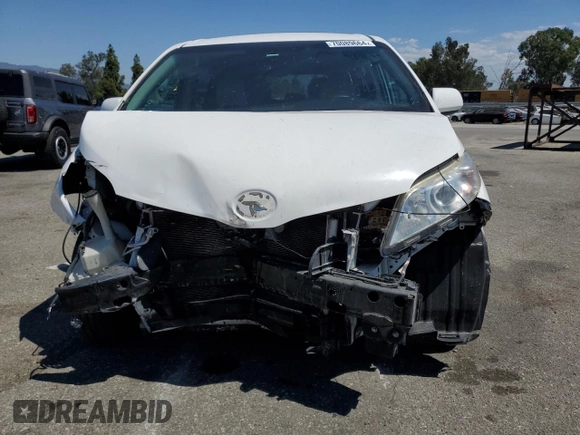 2016 Toyota Sienna LE AAS with VIN 5TDKK3DC4GS717016, listed as a Copart auction lot 70089664 with 131,654 mi miles and Salvage Title. Bid and sale history available at carsss.com. Image 5.