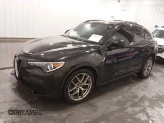 2019 Alfa Romeo Stelvio Ti with VIN ZASPAKBN3K7C71569, listed as a IAAI auction lot 41556814 with 87,279 mi miles and . Bid and sale history available at DreamBid. Image 2.