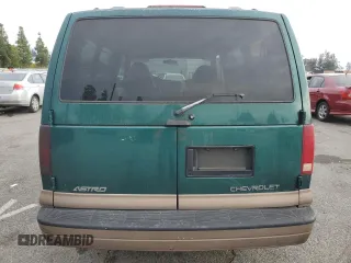 2000 Chevrolet Astro with VIN 1GNDM19W9YB191640, listed as a Copart auction lot 82247164 with 168,605 mi miles and Salvage Title. Bid and sale history available at carsss.com. Image 6.