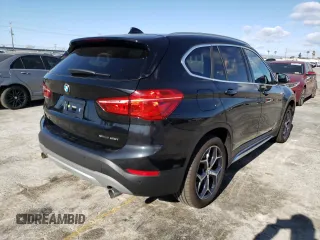 2019 BMW X1 sDrive28i with VIN WBXHU7C52K3H45282, listed as a Copart auction lot 42421563 with 8,057 mi miles. Bid and sale history available at carsss.com. Image 3.