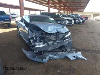 2022 Honda Civic Si with VIN 2HGFE1E58NH473302, listed as a IAAI auction lot 41473435 with 34,685 mi miles and . Bid and sale history available at DreamBid. Image 1.
